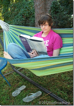 teen reading in a hammock teen reading in a hammock