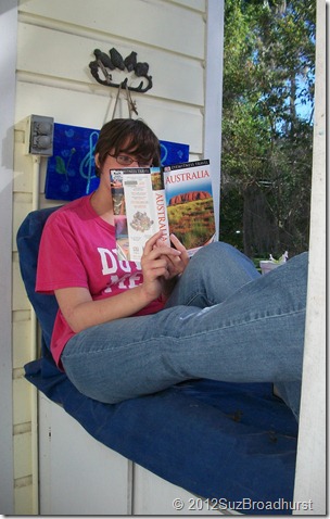Teen reading on the porch Outback on the Back Porch